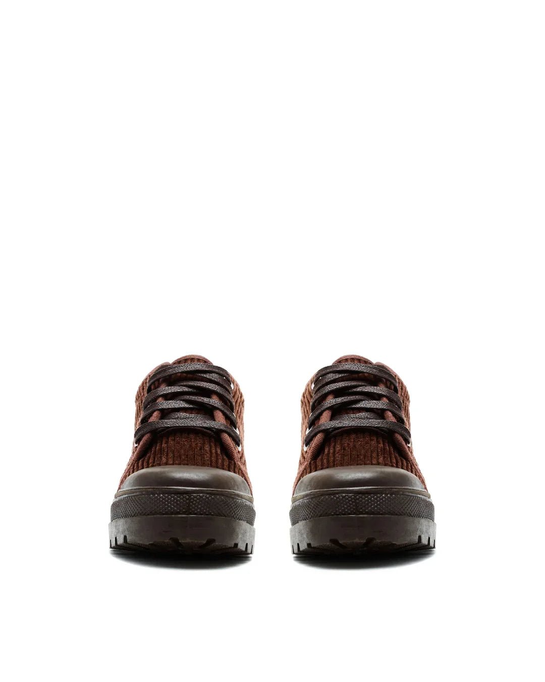 Pair of brown corduroy lace-up sneakers with thick lug soles on a white background