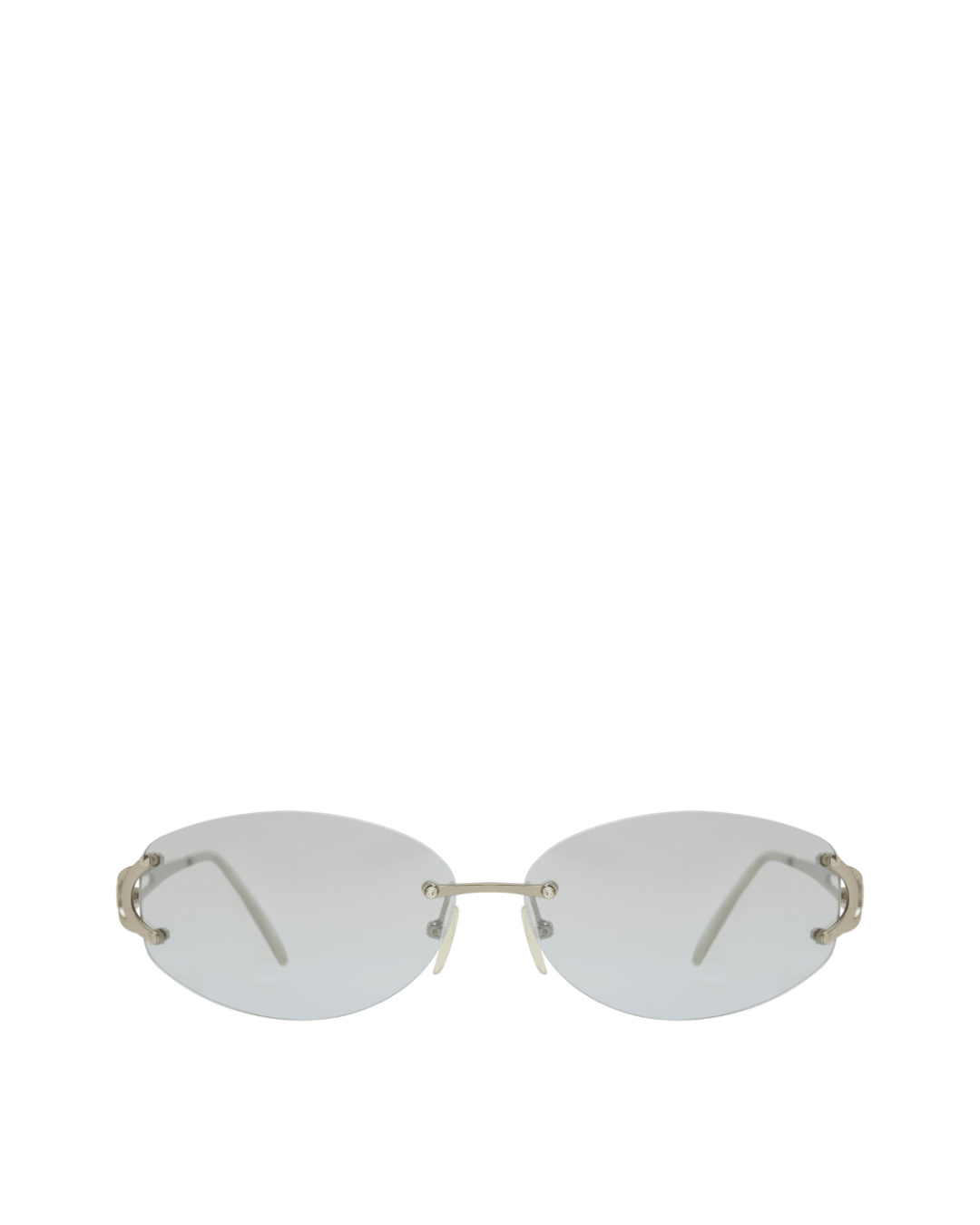 Oval rimless sunglasses with silver metal arms and clear lenses on white background