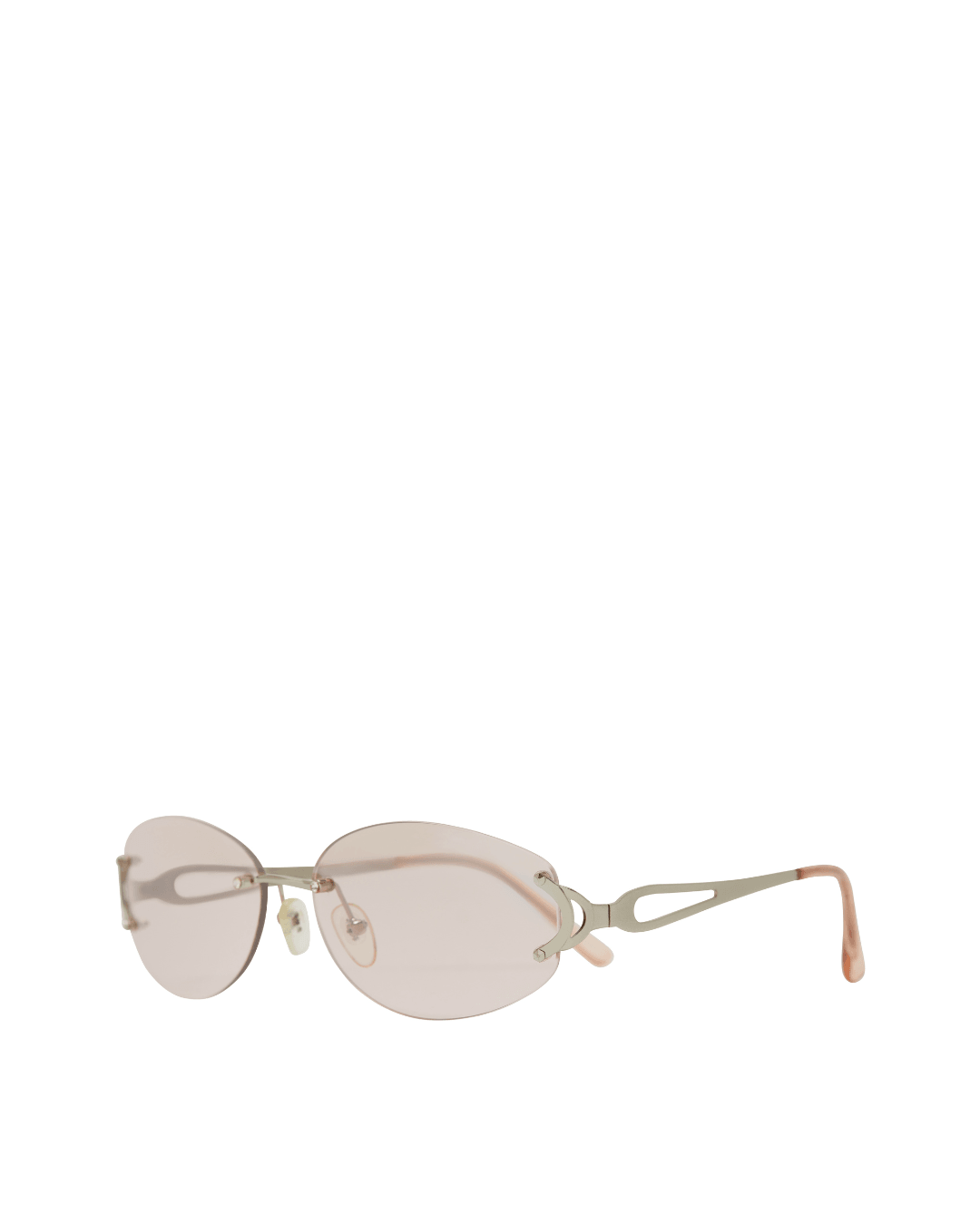 Oval sunglasses with light pink lenses, thin metal frame, and pink temple tips on white background