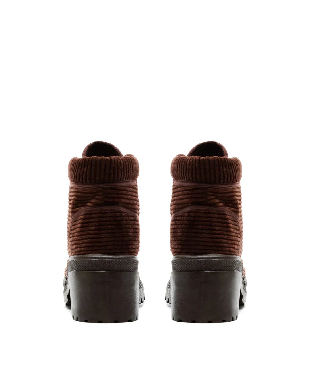 Pair of brown corduroy ankle boots with chunky heels, shown from the back on white background