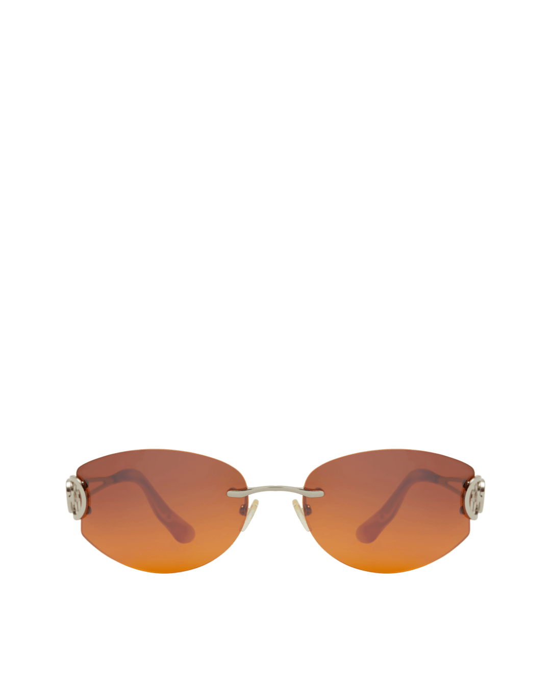 Rimless sunglasses with oval orange gradient lenses and thin metal arms on a white background