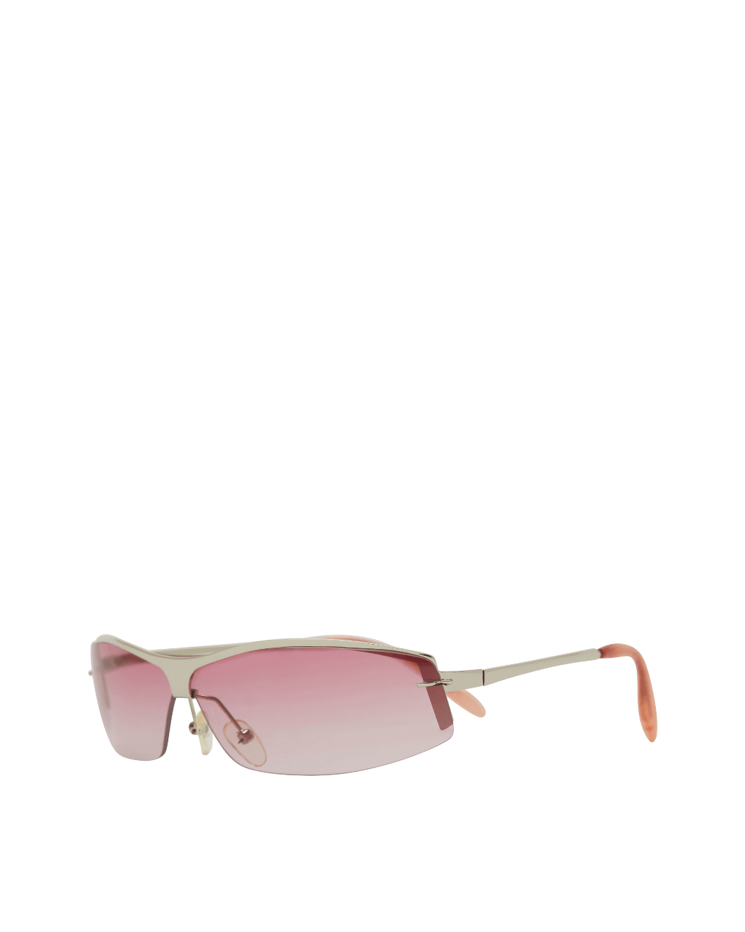 Rimless sunglasses with pink gradient lenses and thin metal arms on a white background