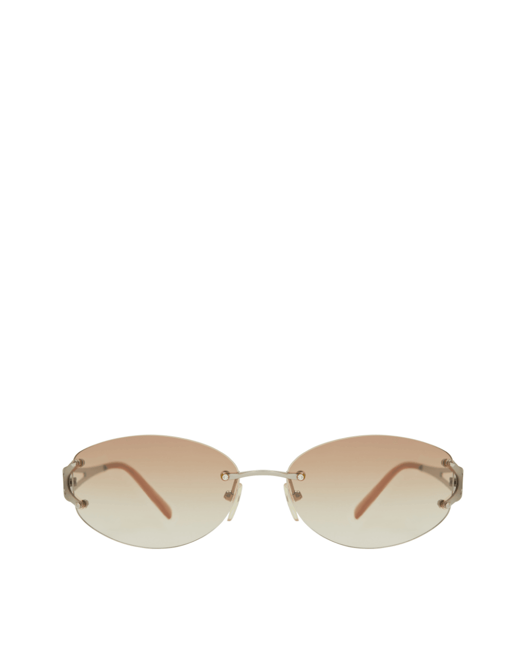 Oval sunglasses with gradient brown lenses and thin metal arms on a white background.