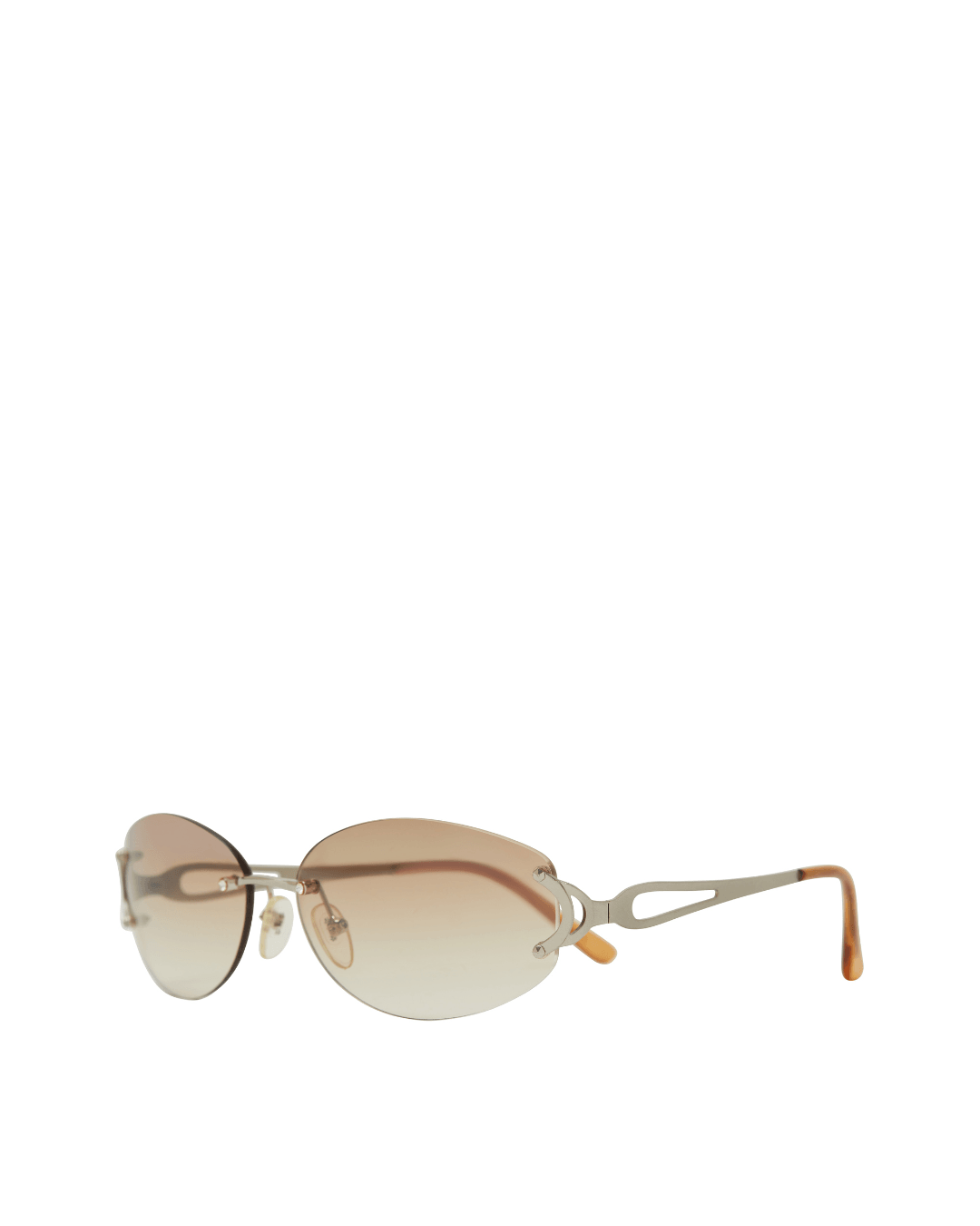 Oval sunglasses with brown gradient lenses and silver metal frames on a white background