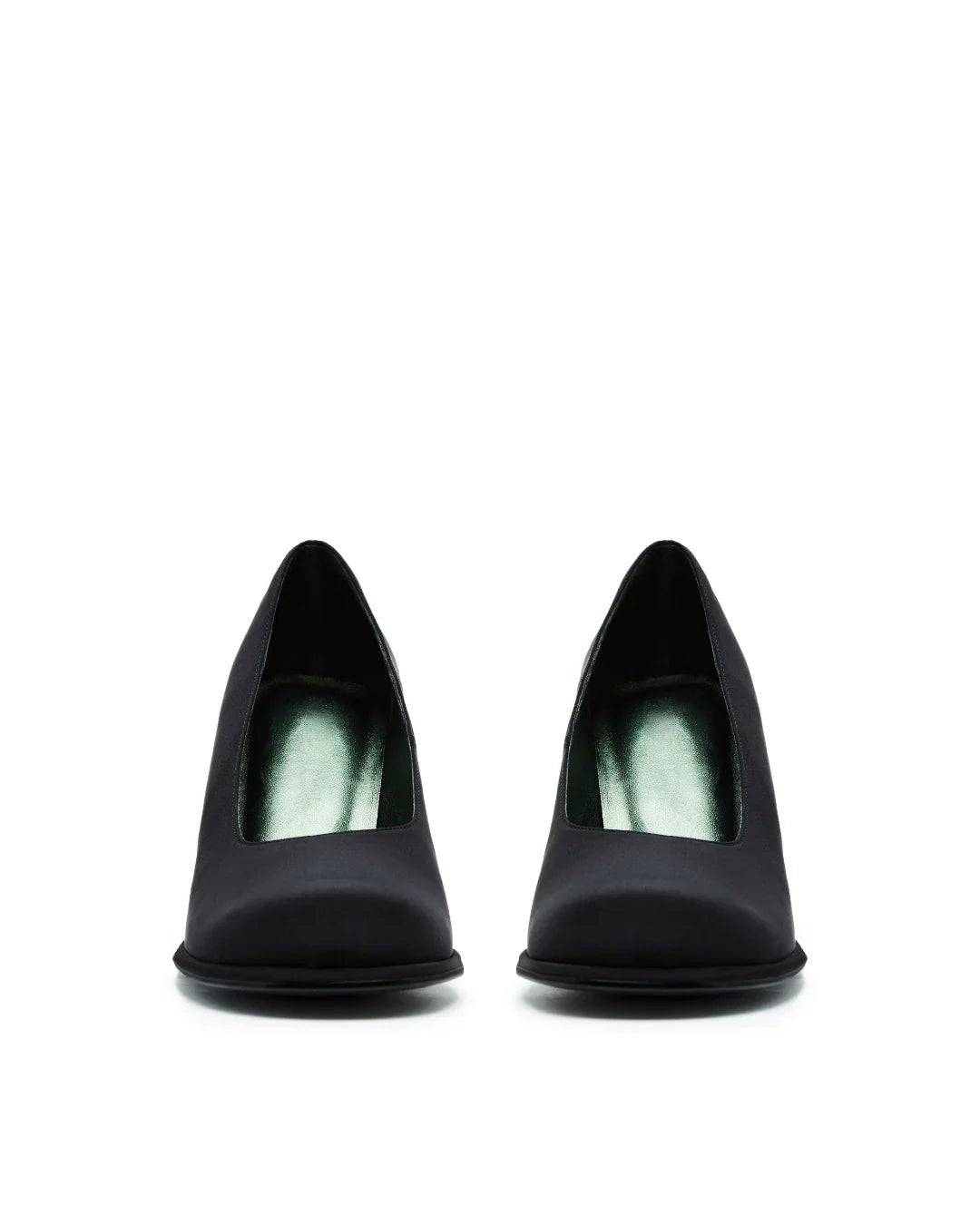 Pair of black nylon pumps with closed toe and square cut front on white background