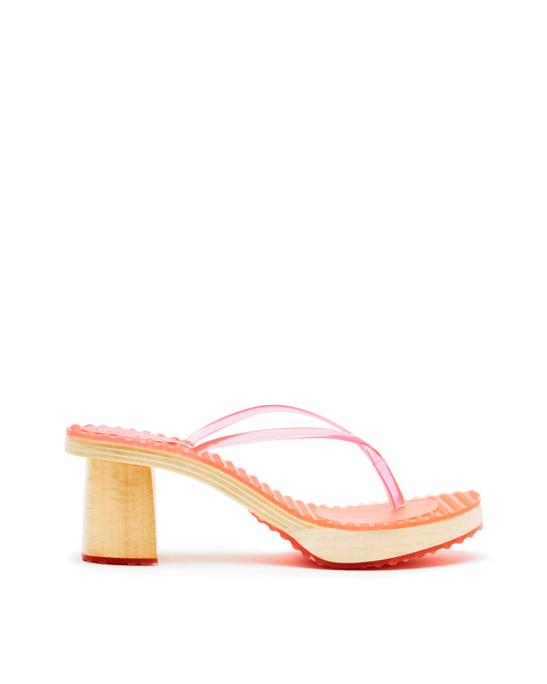 Platform sandal with a pink translucent strap and wood-look heel on a white background