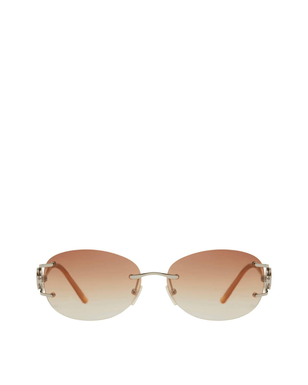 Rimless sunglasses with oval, brown gradient lenses and thin metal arms on white background