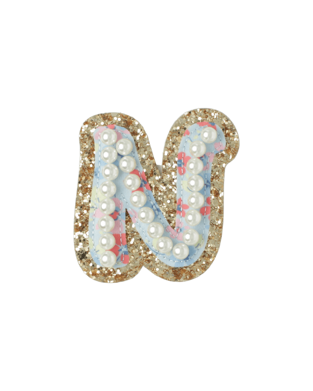 Letter N patch with gold glitter border, blue floral fabric, and pearl accents