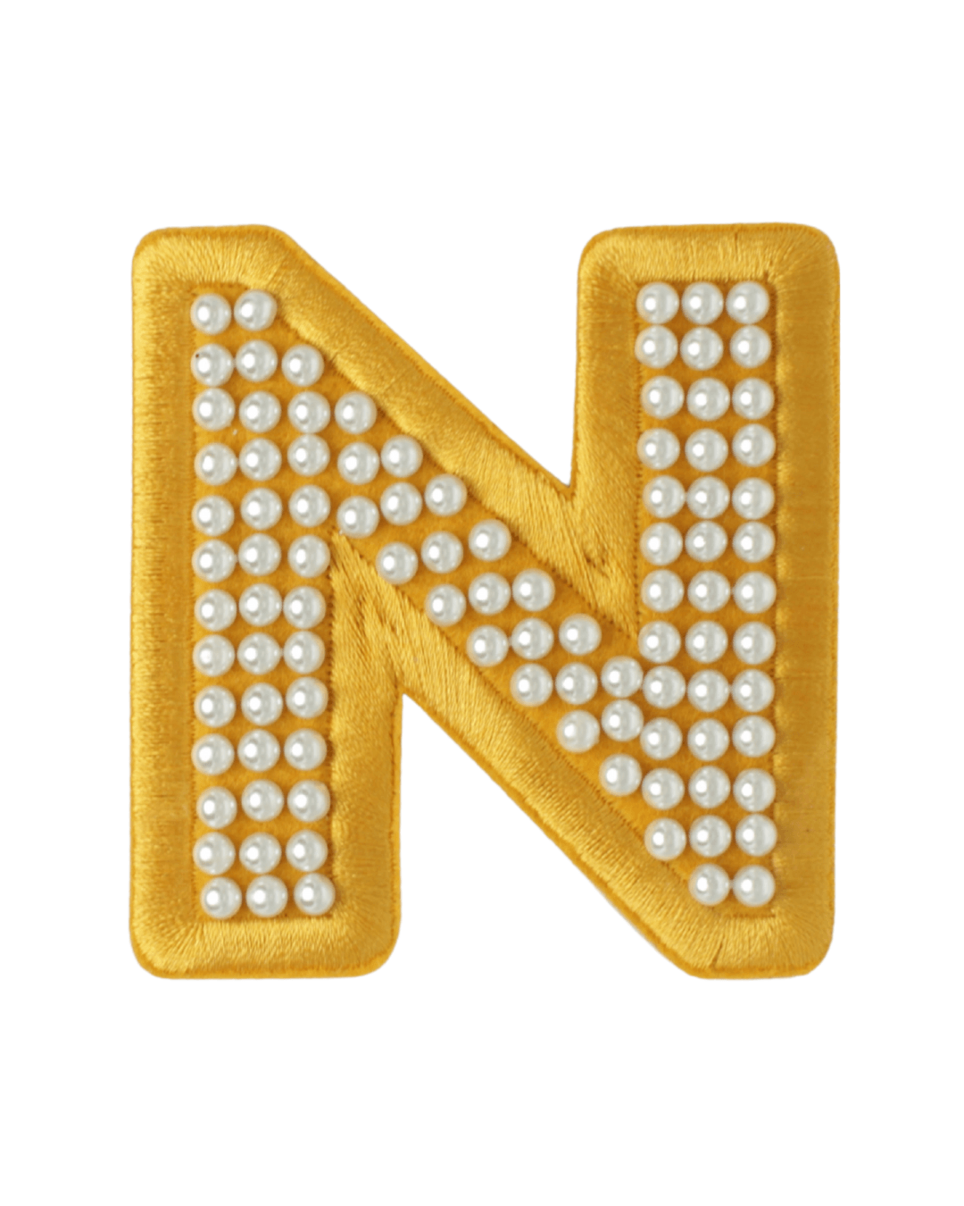 gold satin letter N patch decorated with small white pearls on a white background