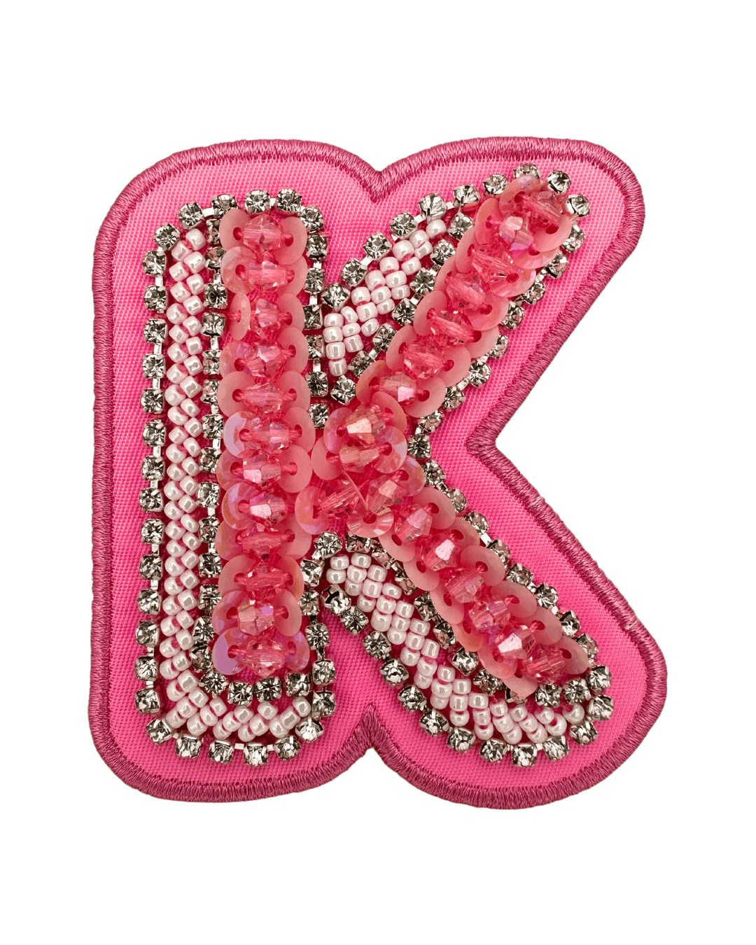Pink fabric letter K patch with sequins, beads, and rhinestone embellishments
