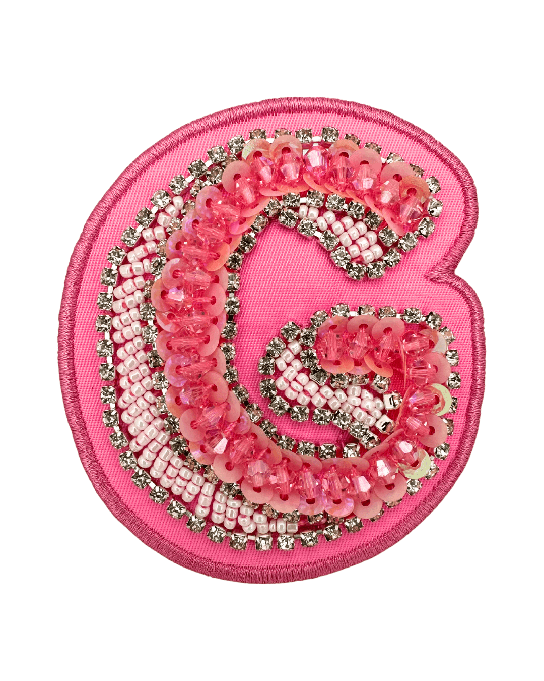 pink fabric letter patch with beaded and sequin embellishments on white background