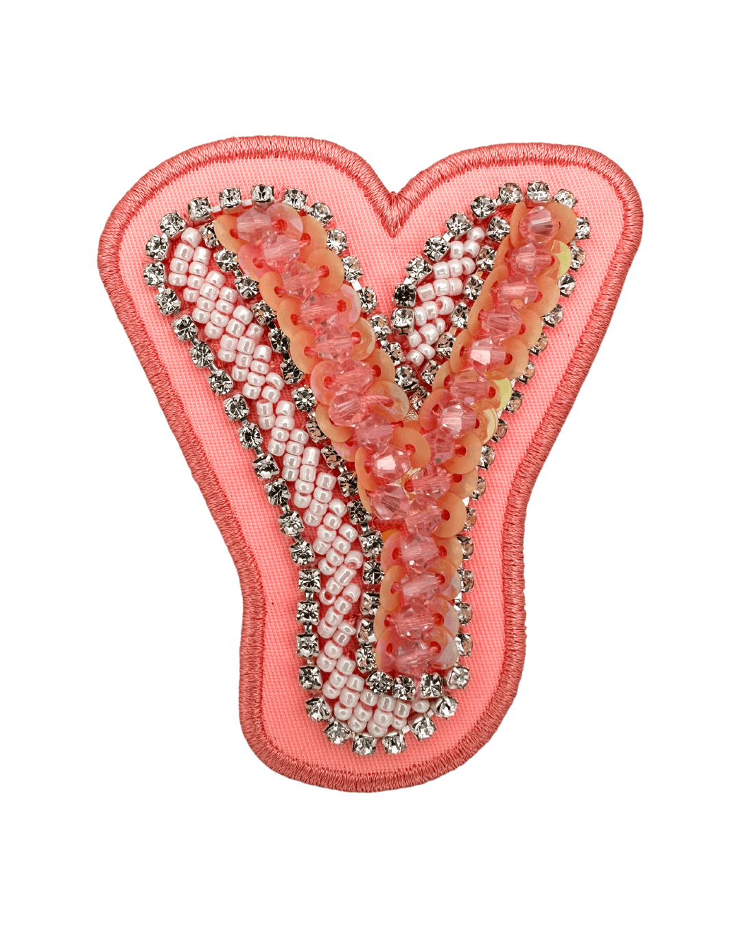 Pink fabric letter patch with bead and sequin embellishments on a white background