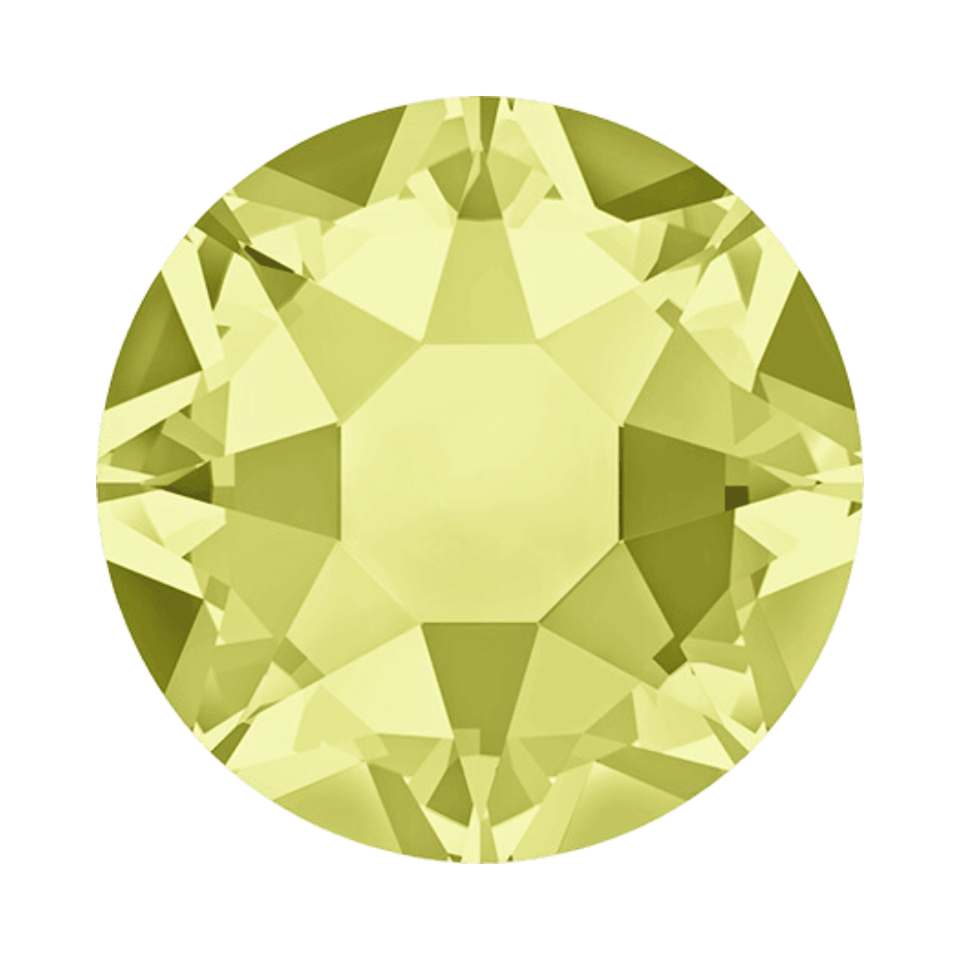Round yellow faceted crystal with geometric cuts on a white background