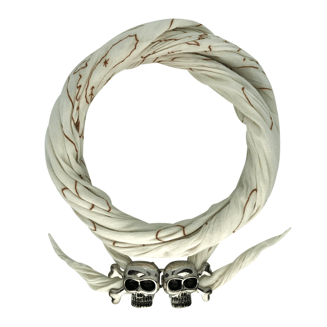 White bandana with brown pattern, twisted and secured with metal skull-shaped clasp