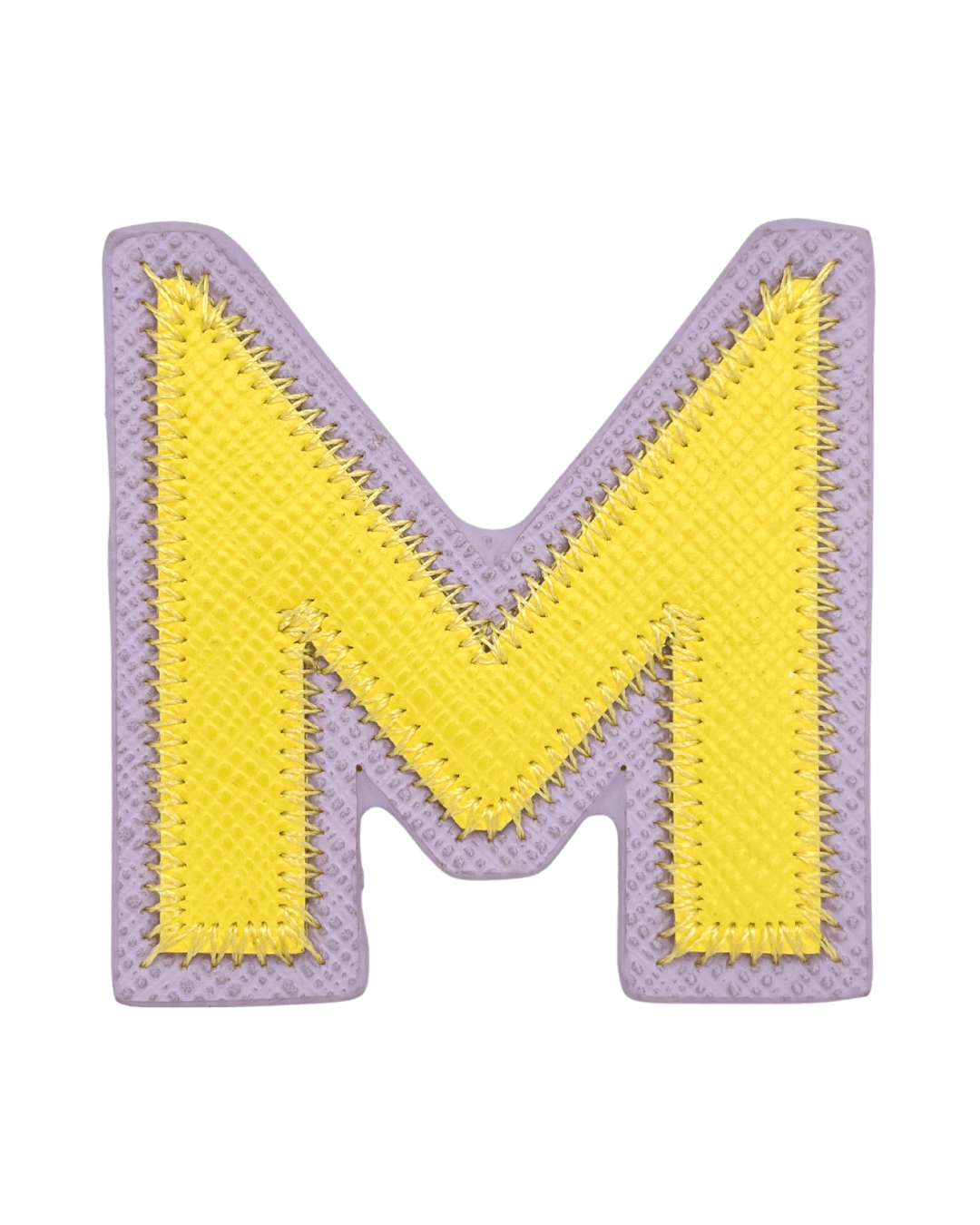Yellow vegan leather letter M patch with purple border on a white background