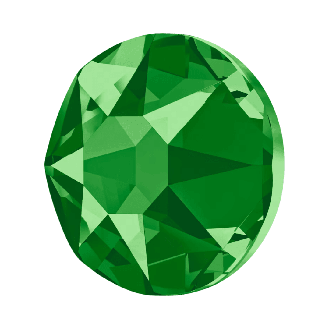 round green crystal with faceted surface on a white background