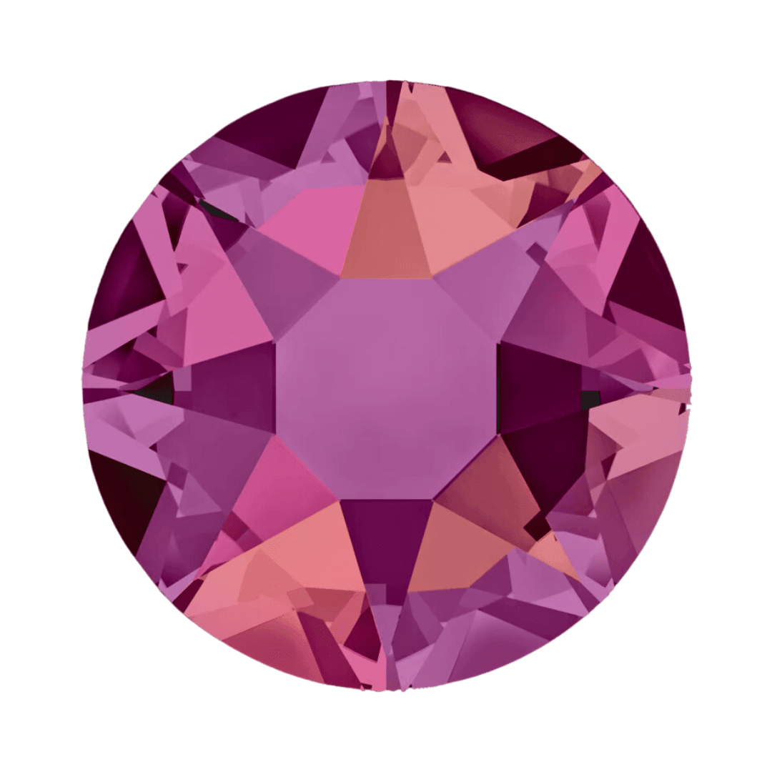 Round faceted crystal in pink and purple hues on a white background