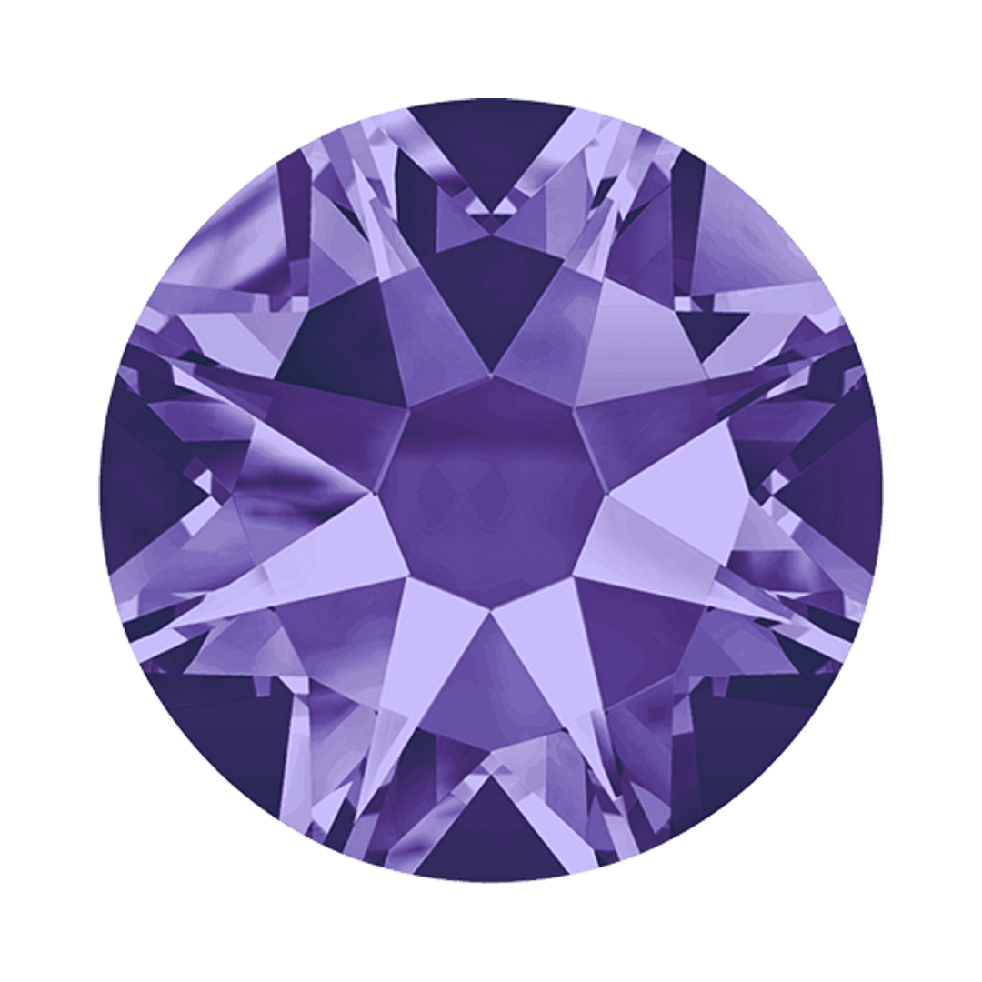 round flatback crystal gem in faceted tanzanite purple with a reflective surface